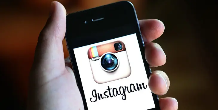 FAIRFAX, CA - DECEMBER 18:  The Instagram logo is displayed on an Apple iPhone on December 18, 2012 in Fairfax, California.  Users of the popular photo-sharing app Instagram are angered over language in Instagram's new terms of service that states that a business may use any of the users photographs in advertising without compensation to the user. The policy is set to go into effect on January 16, 2013. (Photo by Justin Sullivan/Getty Images)