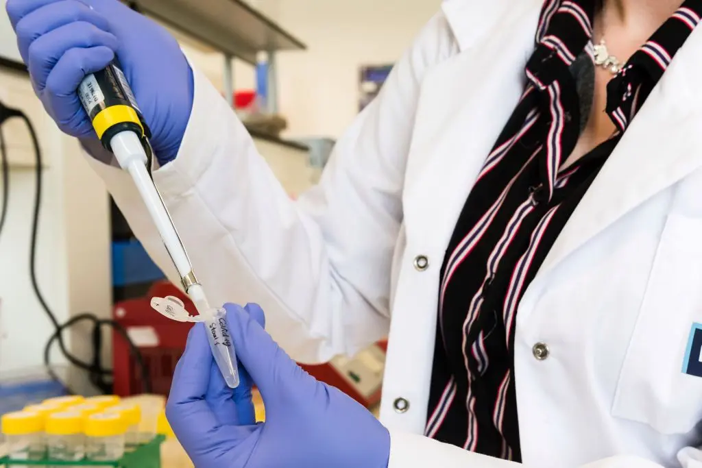 A doctor uses a pipette during coronavirus patient sample detection tests in the virology research labs at UZ Leuven university hospital in Leuven, Belgium, on Friday, Feb. 28, 2020. China has kick-started a clinical trial to speedily test a drug for the novel coronavirus infection as the nation rushes therapies for those afflicted and scours for vaccines to protect the rest. Photographer: Geert Vanden Wijngaert/Bloomberg via Getty Images