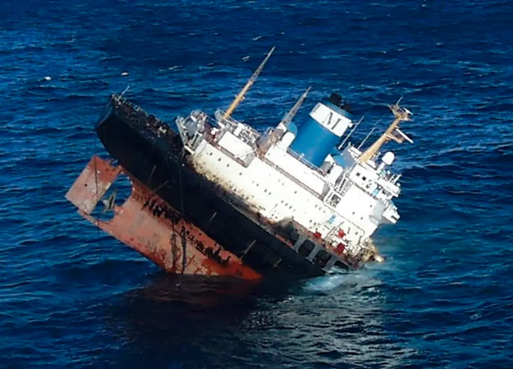 The Bahamas-registered 'Prestige' oil tanker sinks into the Atlantic Ocean in this video grab after it broke in two some 152 miles (244 kilometers) off Spain's coast in the Atlantic Ocean Tuesday Nov. 19, 2002. The stricken tanker sank was originally carrying some 77,000 metric tons, 20.5 million gallons, of fuel oil when it sank threatening an environmental disaster off the northwest coast of Spain and Portugal. *** Local Caption *** DESASTRE ECOLOGICO HUNDIMIENTO DEL BARCO PETROLERO PRESTIGE EN LA COSTA DE GALICIA 2002