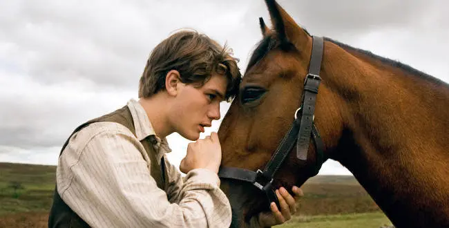"WAR HORSE"
DM-AC-00034
Albert (Jeremy Irvine) and his horse Joey are featured in this scene from DreamWorks Pictures' "War Horse", director Steven Spielberg's epic adventure for audiences of all ages, and an unforgettable odyssey through courage, friendship, discovery and wonder.
Ph: Andrew Cooper, SMPSP
©DreamWorks II Distribution Co., LLC. All Rights Reserved.