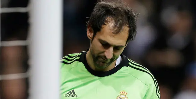 Real Madrid's goalkeeper Diego Lopez reacts after conceding a goal during a Spanish La Liga soccer match against Barcelona, at the Santiago Bernabeu stadium in Madrid, Sunday March 23, 2014.