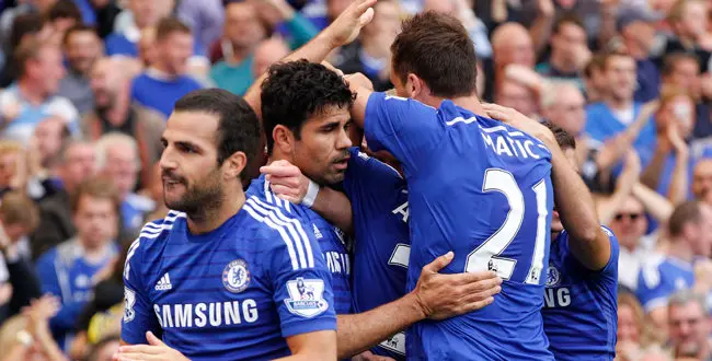 Chelsea's Diego Costa, second left, celebrates his goal against Leicester City with teammates during their English Premier League soccer match at Stamford Bridge, London, Saturday, Aug. 23, 2014. (AP Photo/Sang Tan)