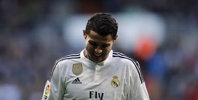 Real Madrid's Cristiano Ronaldo reacts during a Spanish La Liga soccer match between Real Madrid and Espanyol at the Santiago Bernabeu stadium in Madrid, Spain, Saturday, Jan. 10, 2015. (AP Photo/Daniel Ochoa de Olza)