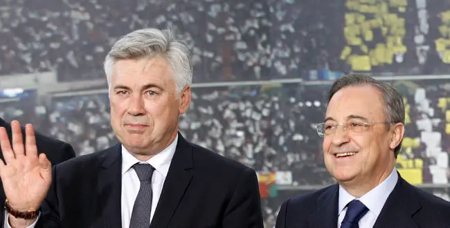 Real Madrid's coach Carlo Ancelotti with Florentino Perez during his presentation at the Bernabeu Stadium, in Madrid on Wednesday, June 26, 2013.