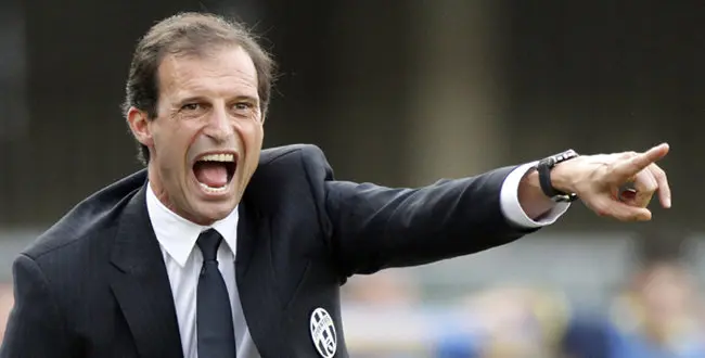 Juventus' coach Massimiliano Allegri shouts during a Serie A soccer match against Chievo Verona at the Bentegodi stadium in Verona, Italy, Saturday, Aug. 30, 2014. (AP Photo/Felice Calabro')
