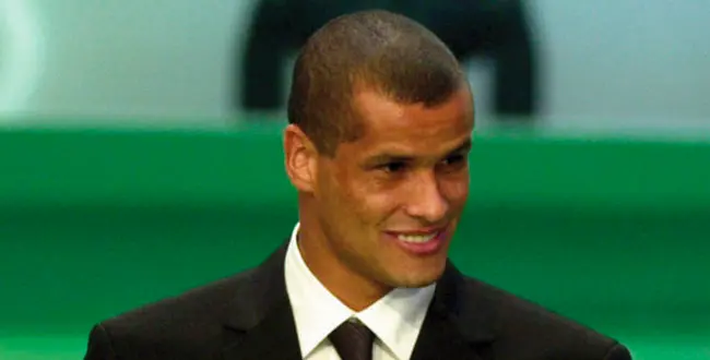Barcelona soccer star Rivaldo, of Brazil, holds the third placed 2000 FIFA Player of the Year award he received during a FIFA Gala, in Rome Monday, Dec. 11, 2000. (AP Photo/Massimo Sambucetti)