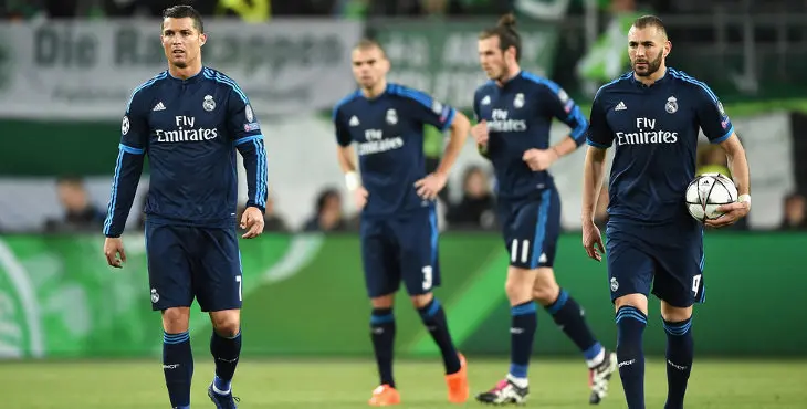WOLFSBURG, GERMANY - APRIL 06:  Cristiano Ronaldo (L) and Karim Benzema (R) of Real Madrid  show their dejeciton after Wolfsburg's second goal during the UEFA Champions League Quarter Final First Leg match between VfL Wolfsburg and Real Madrid at Volkswagen Arena on April 6, 2016 in Wolfsburg, Germany.  (Photo by Stuart Franklin/Bongarts/Getty Images)