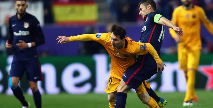 MADRID, SPAIN - APRIL 13: Lionel Messi of FC Barcelona is challenged by Gabi of Atletico during the UEFA Champions League Quarter Final Second Leg match between Club Atletico de Madrid and FC Barcelona at Vincente Calderon on April 13, 2016 in Madrid, Spain. (Photo by Alex Grimm/Bongarts/Getty Images)