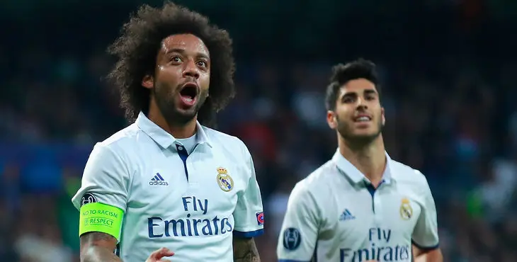 MADRID, SPAIN - OCTOBER 18: Marcelo (L) of Real Madrid celebrates scoring his team's second goal during the UEFA Champions League Group F match between Real Madrid CF and Legia Warszawa at Bernabeu on October 18, 2016 in Madrid, Spain. (Photo by Gonzalo Arroyo Moreno/Getty Images)
