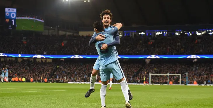 Manchester City's German midfielder Ilkay Gundogan (R) celebrates with Manchester City's Spanish midfielder David Silva after scoring his team's first goal during the UEFA Champions League group C football match between Manchester City and Barcelona at the Etihad Stadium in Manchester, north west England on November 1, 2016. / AFP / PAUL ELLIS        (Photo credit should read PAUL ELLIS/AFP/Getty Images)