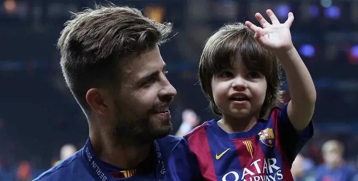BERLIN, GERMANY - JUNE 6: Gerard Pique of Barcelona and his son Milan Pique Mebarak celebrate the victory after the UEFA Champions League Final between Juventus Turin and FC Barcelona at Olympiastadion on June 6, 2015 in Berlin, Germany. (Photo by Jean Catuffe/Getty Images)