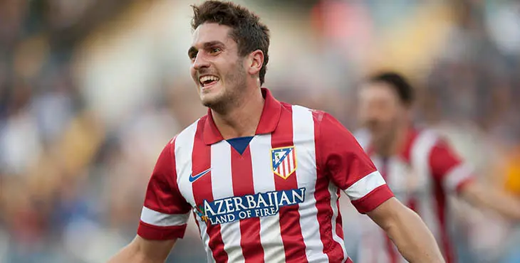 Atletico de Madrid's Jorge Resurreccion "Koke" celebrates his goal during a Spanish La Liga soccer match between Malaga and Atletico de Madrid at the La Rosaleda stadium in Malaga, Spain, Saturday, Jan. 4, 2014. (AP Photo/Daniel Tejedor)