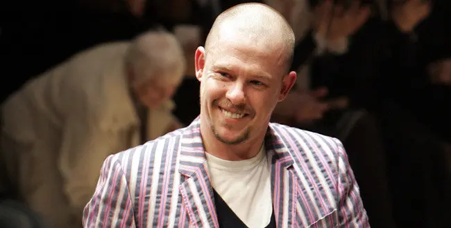 FILE - In this March 3, 2006 file photo, British fashion designer Alexander McQueen aknowledges applause after the presentation of his ready-to-wear fall/winter 2006-2007 fashion collection, in Paris.
