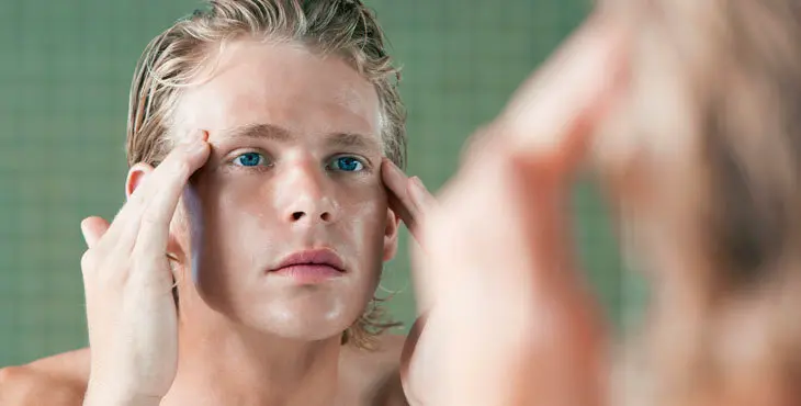 Man Applying Facial Cream