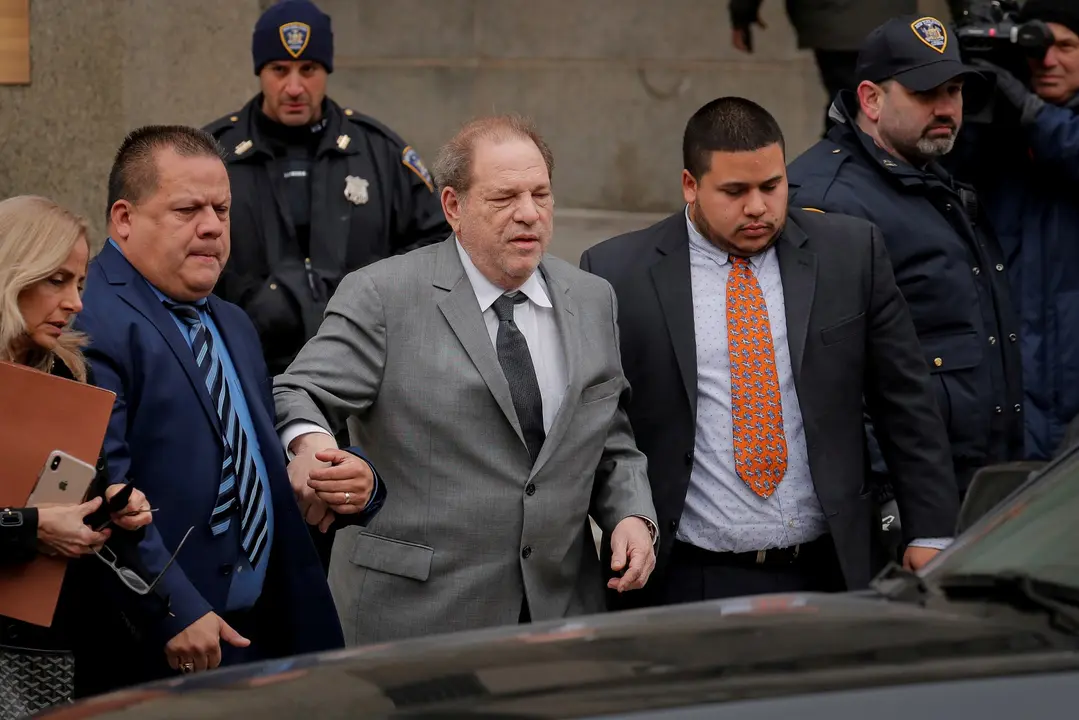 FILE PHOTO: Film producer Harvey Weinstein exits following a hearing in his sexual assault case at New York State Supreme Court in New York, U.S., December 6, 2019. REUTERS/Lucas Jackson/File Photo