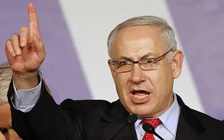 ** FILE ** In this Feb. 11, 2009 file photo, Israel's Likud Party leader Benjamin Netanyahu addresses supporters at the Likud election headquarters at the convention center in Tel Aviv. Far-right politician Avigdor Lieberman endorsed Benjamin Netanyahu for Israeli prime minister on Thursday, Feb. 19, 2009, all but guaranteeing that the U.S.-educated hawk will be the country's next leader. (AP Photo/Bernat Armangue, File)