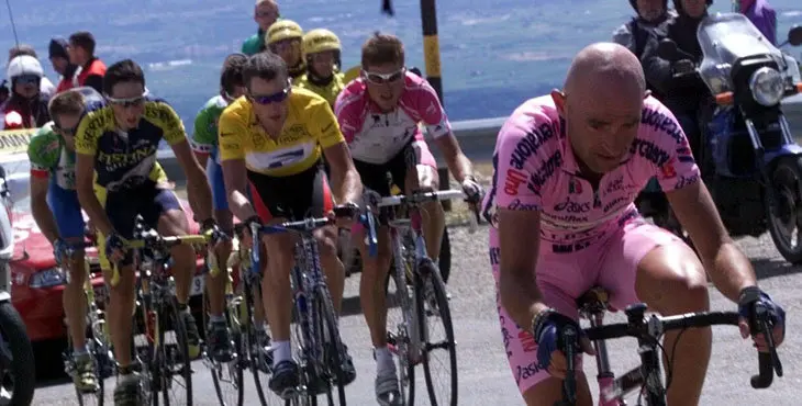 Marco Pantani of Italy, right, rides to victory ahead of Lance Armstrong, of Austin, Texas, left center wearing the yellow jersey, and Jan Ullrich of Germany, second from right, during the 12th stage of the Tour de France cycling race between Carpentras and Mont Ventoux, southern France, Thursday, July 13, 2000. (AP Photo/Pool/Patrick Boutroux)