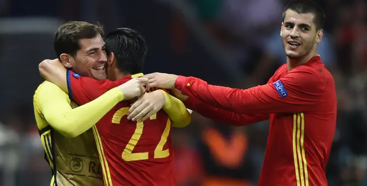 Spain's forward Nolito (C) celebrates his goal, and his team's second, with Spain's goalkeeper Iker Casillas (L) and Spain's forward Alvaro Morata during the Euro 2016 group D football match between Spain and Turkey at the Allianz Riviera stadium in Nice on June 17, 2016. / AFP / BULENT KILIC (Photo credit should read BULENT KILIC/AFP/Getty Images)