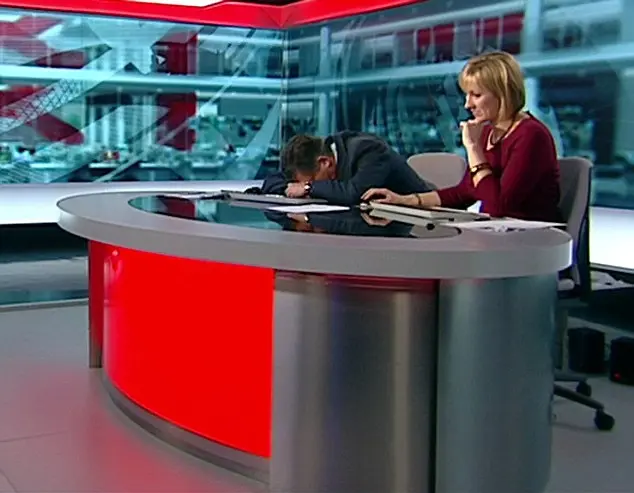 BBC London newsreader Simon McCoy appearing to be asleep when the camera cut away for him to read the local news.
Daily mail Picture Desk grab from BBC Breakfast News