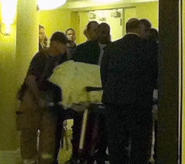 **MINIMUM REPRO FEE OF 2000 POUNDS APPLIES TO THIS SET PRINT ONLY WEB FEE TO BE AGREED**£1000 online use
EXCLUSIVE: **NO USA TV AND NO USA WEB** Whitney Houston's body is removed from her room at the Beverly Hills Hotel on a gurney.
The photograph was obtained by celebrity website TMZ.com.
<P>
Pictured: What is believed to be Whitney Houston on a gurney
<B>Ref: SPL359627  120212   EXCLUSIVE</B><BR />
Picture by: TMZ.com / Splash News<BR />
</P><P>
<B>Splash News and Pictures</B><BR />
Los Angeles:310-821-2666<BR />
New York:212-619-2666<BR />
London:870-934-2666<BR />
photodesk@splashnews.com<BR />
</P>