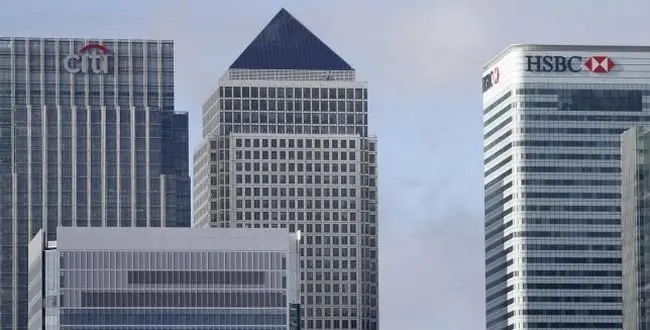 The Canary Wharf financial district is seen in east London November 12, 2014. REUTERS/Suzanne Plunkett