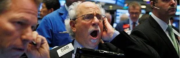 Traders work on the floor of the New York Stock Exchange (NYSE) in New York City, U.S., October 21, 2016. REUTERS/Brendan McDermid - RTX2PW06