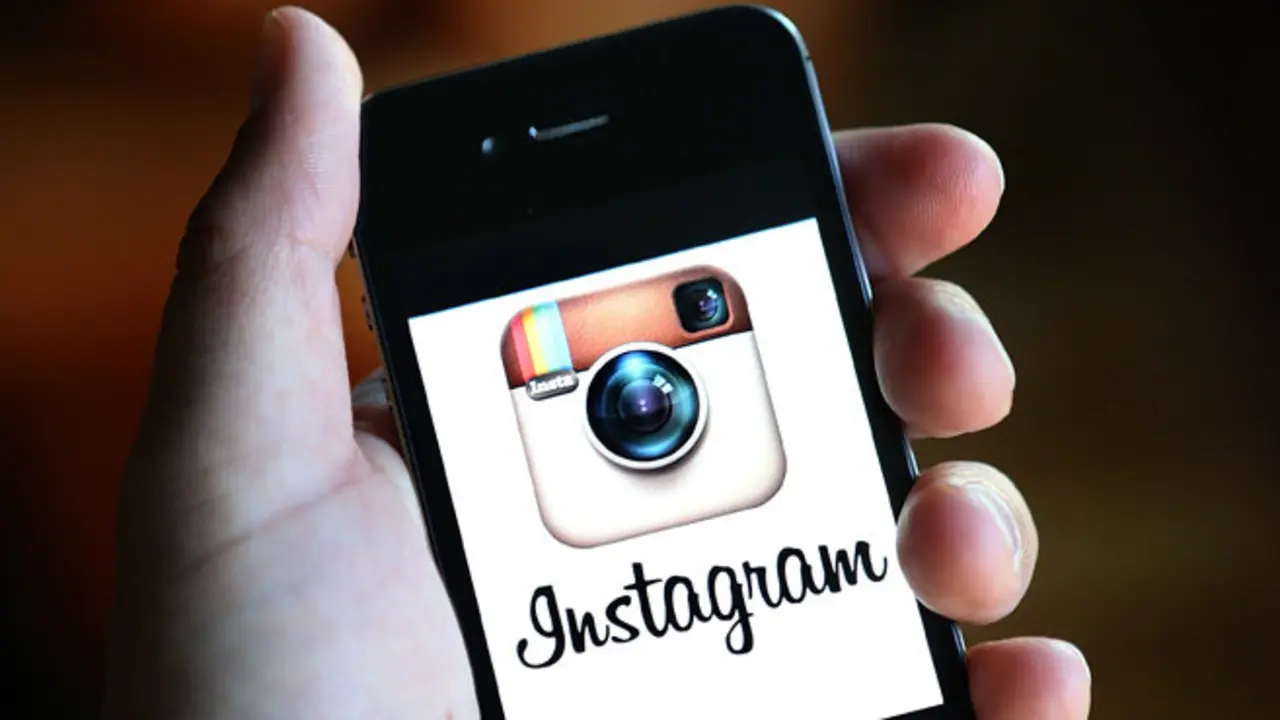 FAIRFAX, CA - DECEMBER 18:  The Instagram logo is displayed on an Apple iPhone on December 18, 2012 in Fairfax, California.  Users of the popular photo-sharing app Instagram are angered over language in Instagram's new terms of service that states that a business may use any of the users photographs in advertising without compensation to the user. The policy is set to go into effect on January 16, 2013. (Photo by Justin Sullivan/Getty Images)