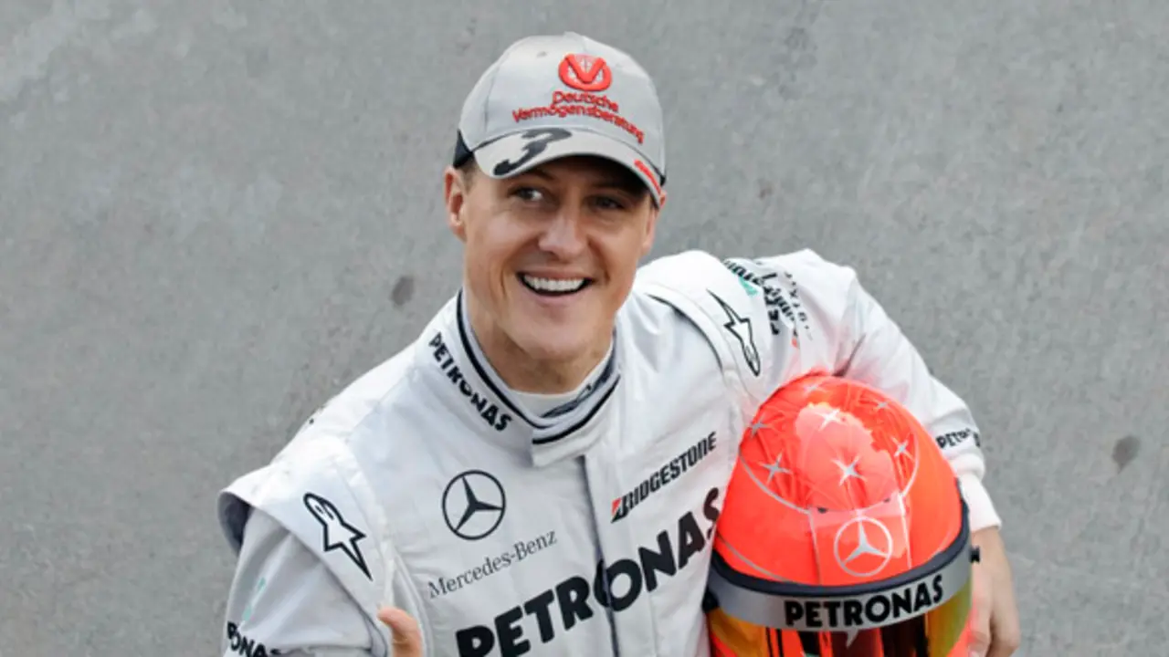 Mercedes Formula One driver Michael Schumacher of Germany poses during a photo call at the Ricardo Tormo race track in Cheste, just outside Valencia, Spain Monday Feb. 1, 2010 (AP Photo/Daniel Ochoa de Olza)