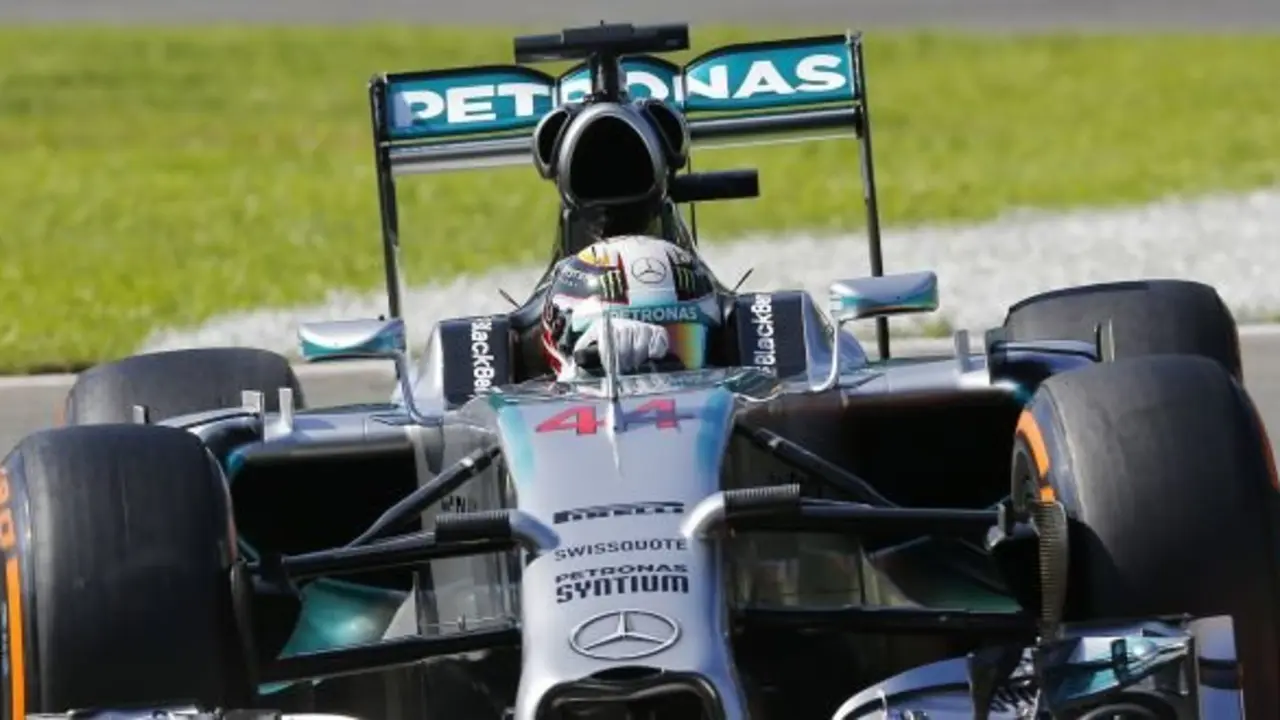 Britain's driver Lewis Hamilton steers his Mercedes during the third free practice session at the Monza racetrack, in Monza, Italy, Saturday, Sept. 6, 2014. The Formula One race will be held on Sunday. (AP Photo/Antonio Calanni)