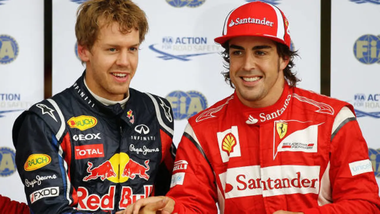 MONTREAL, CANADA - JUNE 11:  Pole sitter Sebastian Vettel (L) of Germany and Red Bull Racing celebrates with second placed Fernando Alonso (R) of Spain and Ferrari after qualifying for the Canadian Formula One Grand Prix at the Circuit Gilles Villeneuve on June 11, 2011 in Montreal, Canada.  (Photo by Paul Gilham/Getty Images) *** Local Caption *** Sebastian Vettel; Fernando Alonso