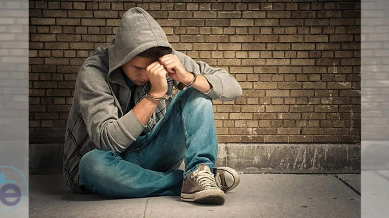 Arrested teenager with handcuffs on his handsPlease see similar images here: