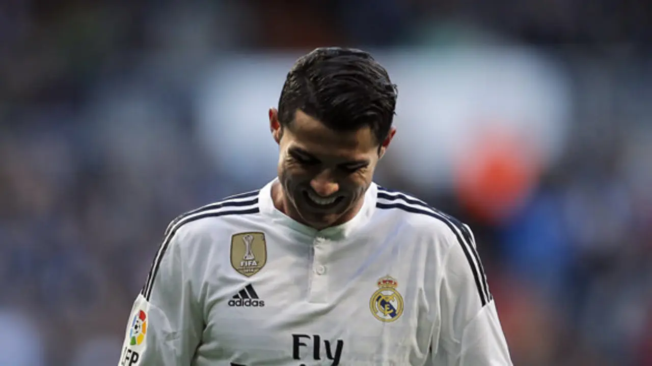 Real Madrid's Cristiano Ronaldo reacts during a Spanish La Liga soccer match between Real Madrid and Espanyol at the Santiago Bernabeu stadium  in Madrid, Spain, Saturday, Jan. 10, 2015. (AP Photo/Daniel Ochoa de Olza)