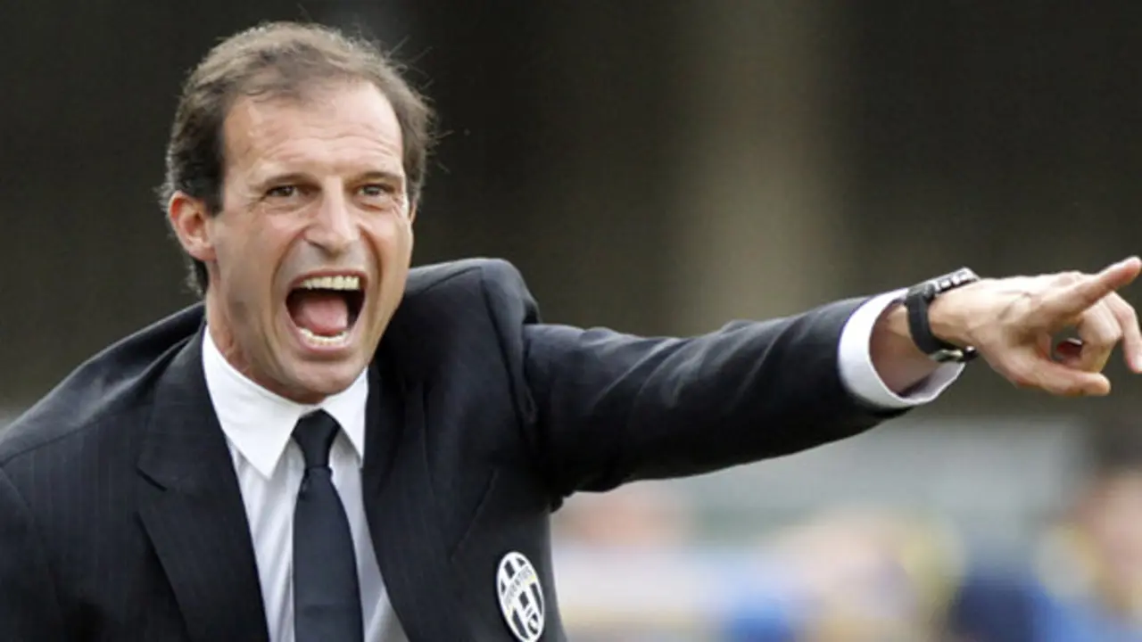Juventus' coach Massimiliano Allegri shouts during a Serie A soccer match against Chievo Verona at the Bentegodi stadium in Verona, Italy, Saturday, Aug. 30, 2014. (AP Photo/Felice Calabro')