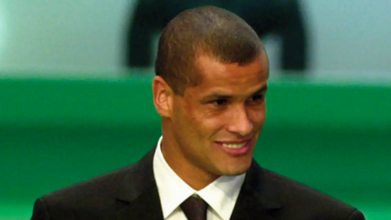 Barcelona soccer star Rivaldo, of Brazil, holds the third placed 2000 FIFA Player of the Year award he received during a FIFA Gala, in Rome Monday, Dec. 11, 2000. (AP Photo/Massimo Sambucetti)