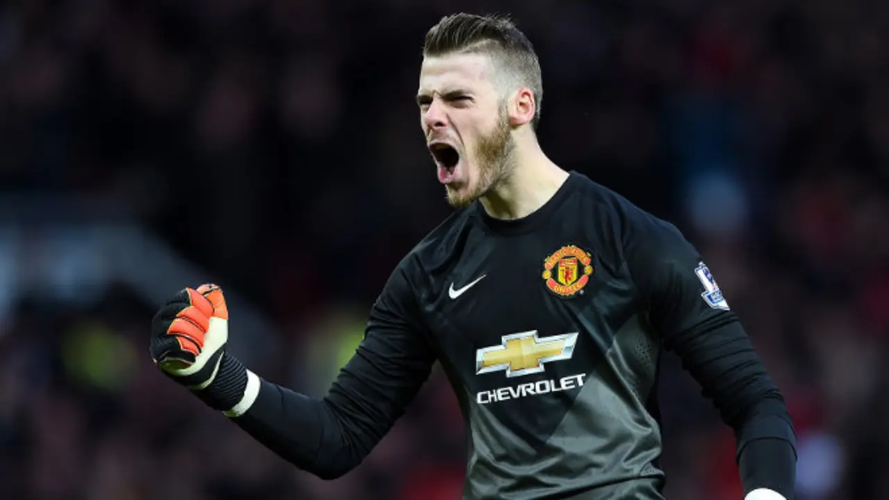 MANCHESTER, ENGLAND - DECEMBER 14:  David De Gea of Manchester United celebrates the first goal during the Barclays Premier League match between Manchester United and Liverpool at Old Trafford on December 14, 2014 in Manchester, England.  (Photo by Shaun Botterill/Getty Images)