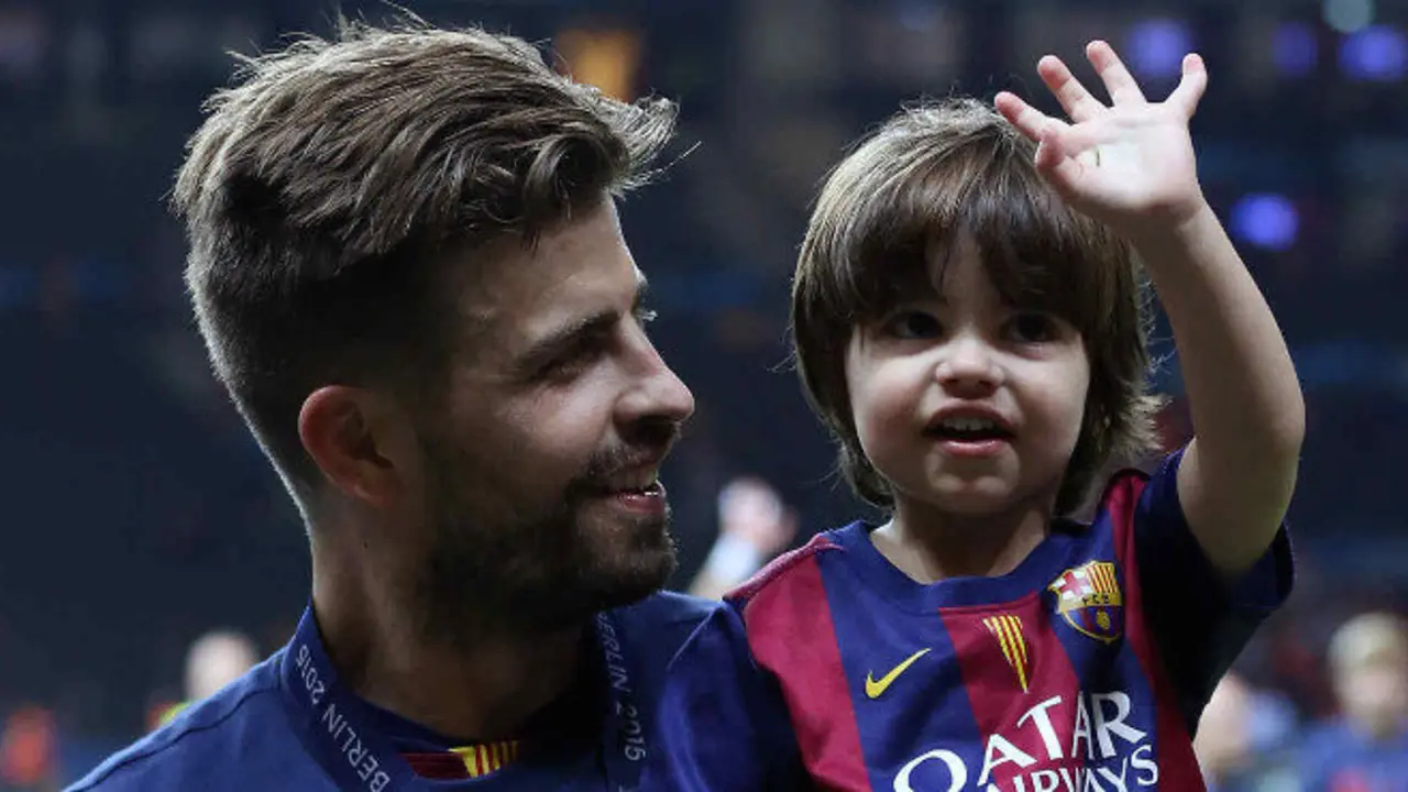 BERLIN, GERMANY - JUNE 6: Gerard Pique of Barcelona and his son Milan Pique Mebarak celebrate the victory after the UEFA Champions League Final between Juventus Turin and FC Barcelona at Olympiastadion on June 6, 2015 in Berlin, Germany. (Photo by Jean Catuffe/Getty Images)
