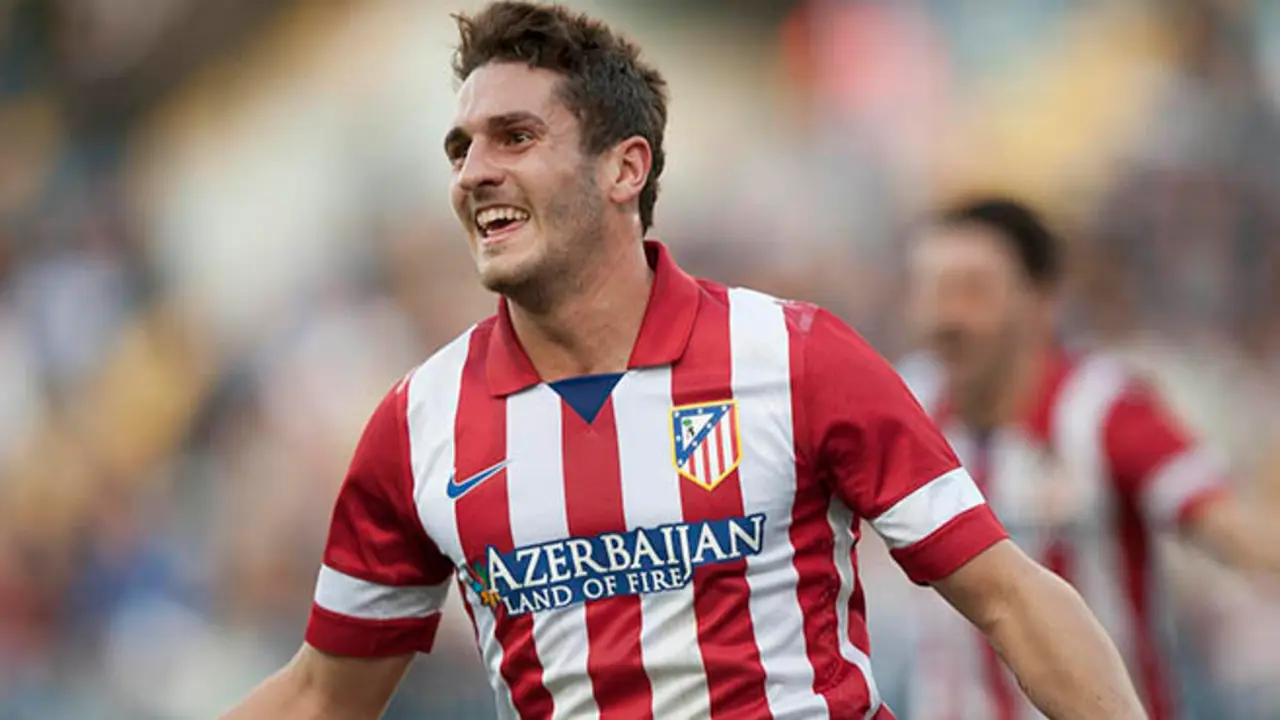 Atletico de Madrid's Jorge Resurreccion "Koke" celebrates his goal during a Spanish La Liga soccer match between Malaga and Atletico de Madrid at the La Rosaleda stadium in Malaga, Spain, Saturday, Jan. 4, 2014. (AP Photo/Daniel Tejedor)