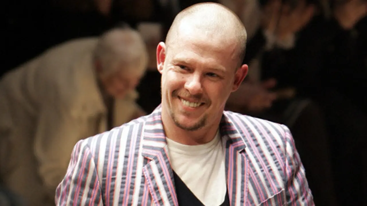 FILE - In this March 3, 2006 file photo, British fashion designer Alexander McQueen aknowledges applause after the presentation of his ready-to-wear fall/winter 2006-2007 fashion collection, in Paris.