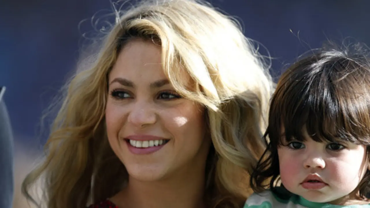 Singer Shakira holds her son Milan Pique during the closing ceremony for the World Cup before the final match at Maracana Stadium in Rio de Janeiro, Brazil, Sunday, July 13, 2014