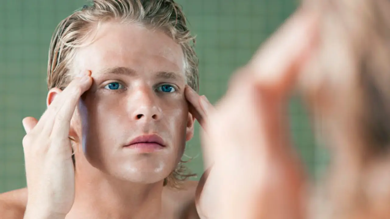 Man Applying Facial Cream