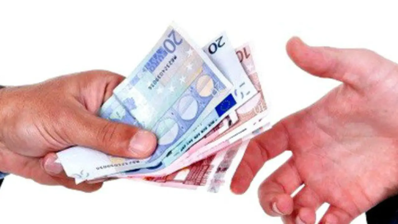 Euro bills changing hands isolated in white