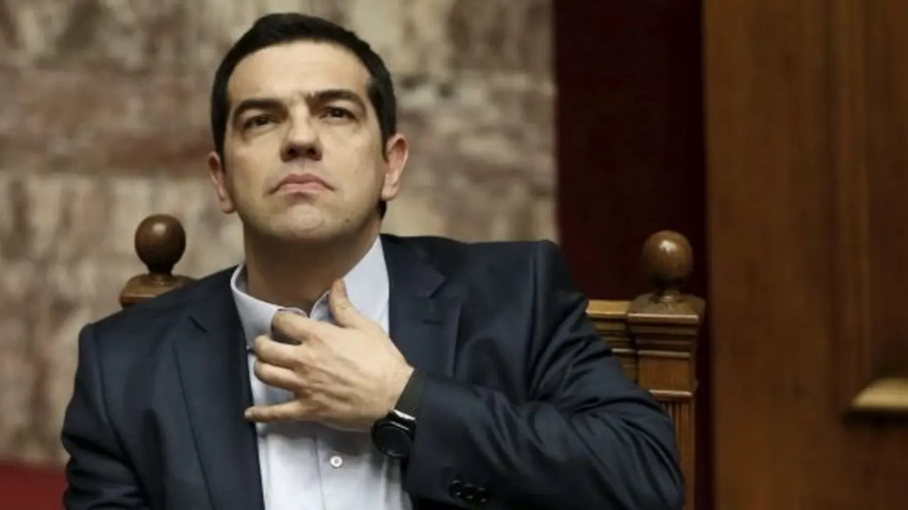Greek Prime Minister Alexis Tsipras gestures before his speech during a parliament session in Athens March 30, 2015. Tsipras said on Monday his government was ready to implement a deal struck with euro zone lenders in February but would not do it at any cost. REUTERS/Alkis Konstantinidis