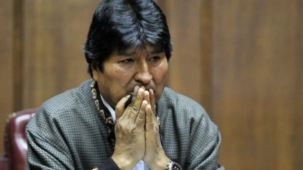(FILES) In this file picture taken on November 27, 2019 Bolivia's exiled ex-President Evo Morales gestures as he delivers a speech at the Mexican Journalists Club, in Mexico City, on November 27, 2019. - Bolivia's attorney general's office ordered the arrest of exiled former president Evo Morales on December 18, 2019 following the interim government's accusation of sedition and terrorism. Morales fled Bolivia for Mexico last month and then to Argentina after civil unrest broke out following his controversial re-election in an October 20 poll widely denounced as rigged. (Photo by CLAUDIO CRUZ / AFP)
