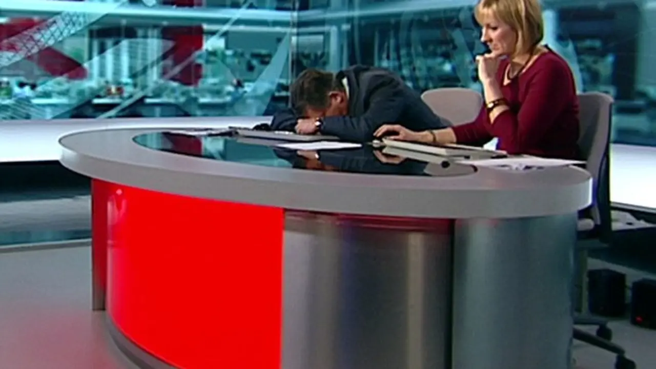 BBC London newsreader Simon McCoy appearing to be asleep when the camera cut away for him to read the local news.
Daily mail Picture Desk grab from BBC Breakfast News