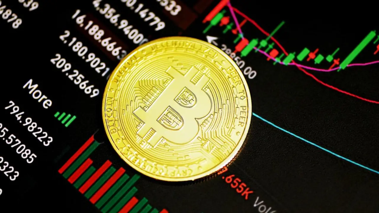 Imagen de una moneda virtual. Fuente Kancharana Unplash