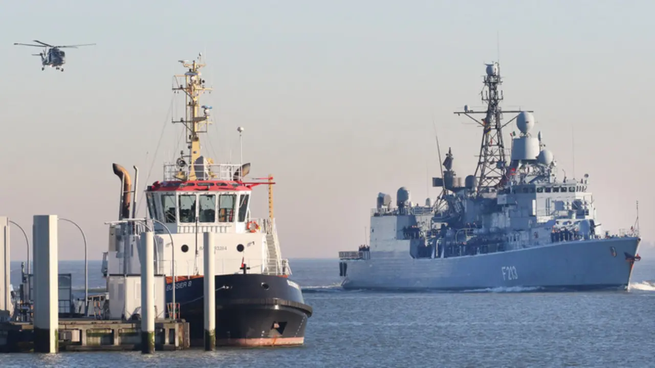 epa07371756 The frigate F213 'Augsburg' (R) of the German Navy (Bundesmarine) returns from the EUNAVFOR MED (European Union Naval Force ? Mediterranean) Operation SOPHIA to its  home port Wilhelmshaven, northern Germany, 15 February 2019. After five month in the Mediterranean Sea, the almost 30 years old vessel finishes its last official mission before being decommissioned in late 2019.  EPA-EFE/FOCKE STRANGMANN
