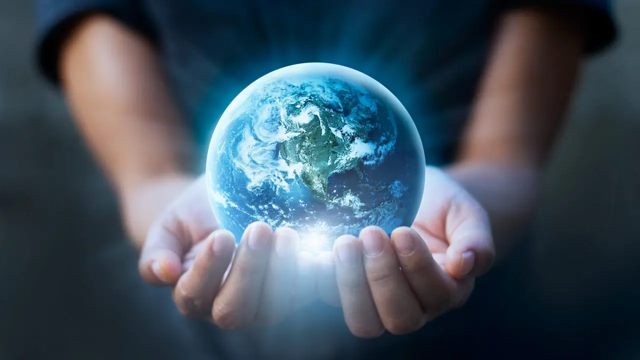 Earth day, Human hands holding blue earth, save earth concept. Elements of this image furnished by NASA