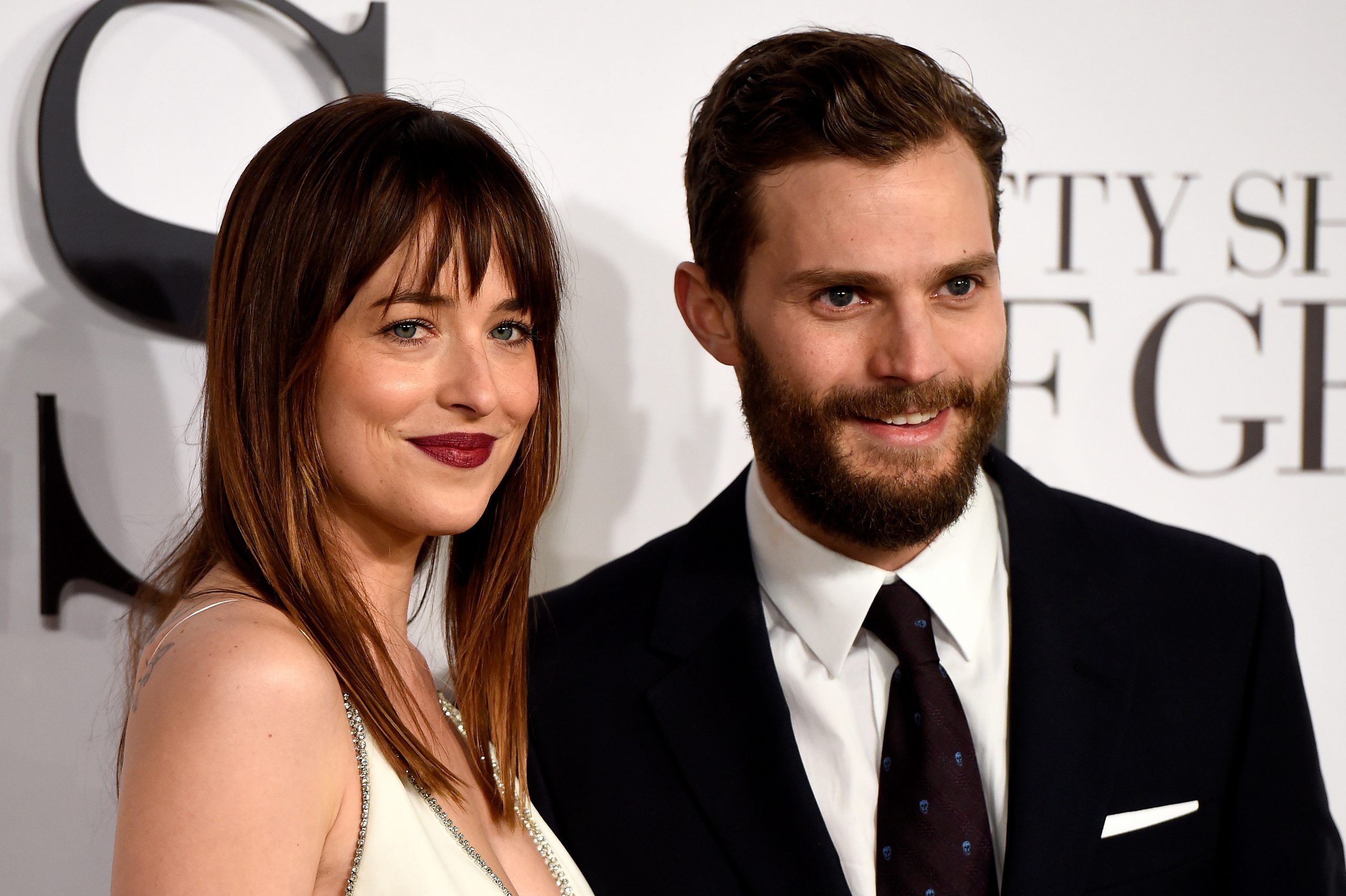 LONDON, ENGLAND - FEBRUARY 12:  Dakota Johnson and Jamie Dornan attend the UK Premiere of 